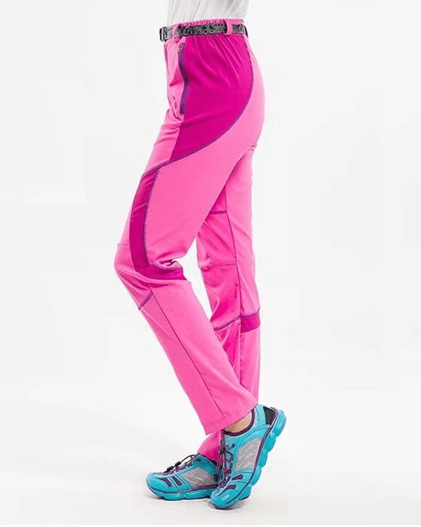Pink breathable quick-drying women's hiking pants with Drytek technology, windproof, and ideal for outdoor adventures.